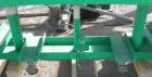 Used: Lexco long deck hydraulic lift table, model STN3010-2F, carbon steel. Approximately 2000 pound lift capacity, 30