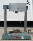 Used TMI Pendulum Impact Tester. Approximately 11' per second. Requires pendulum arm.