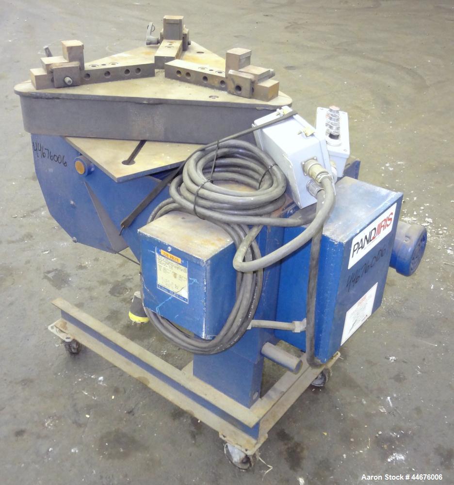 Used Pandjiris Welding Positioner, Model 15-4. Approximate 1,500 pound capacity 4” overhung from face of table, swing radius 20” at 90 degree tilt, rotational speed from 0.08 to 1.60 rpm, tilt range ...