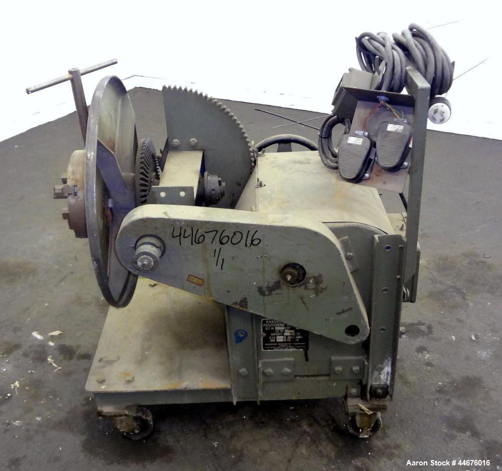 Used Ransome Welding Positioner, Size 5-HT. Approximate 500 pound capacity, foot pedal, and pendant control. Mounted on a frame with casters.
