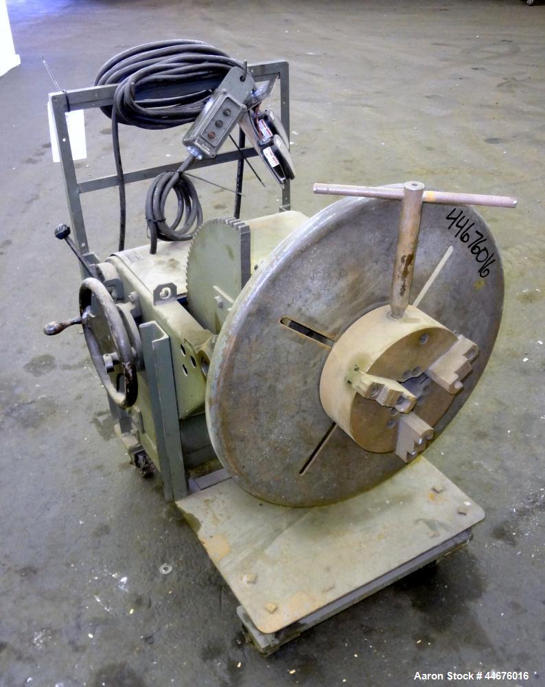 Used Ransome Welding Positioner, Size 5-HT. Approximate 500 pound capacity, foot pedal, and pendant control. Mounted on a frame with casters.