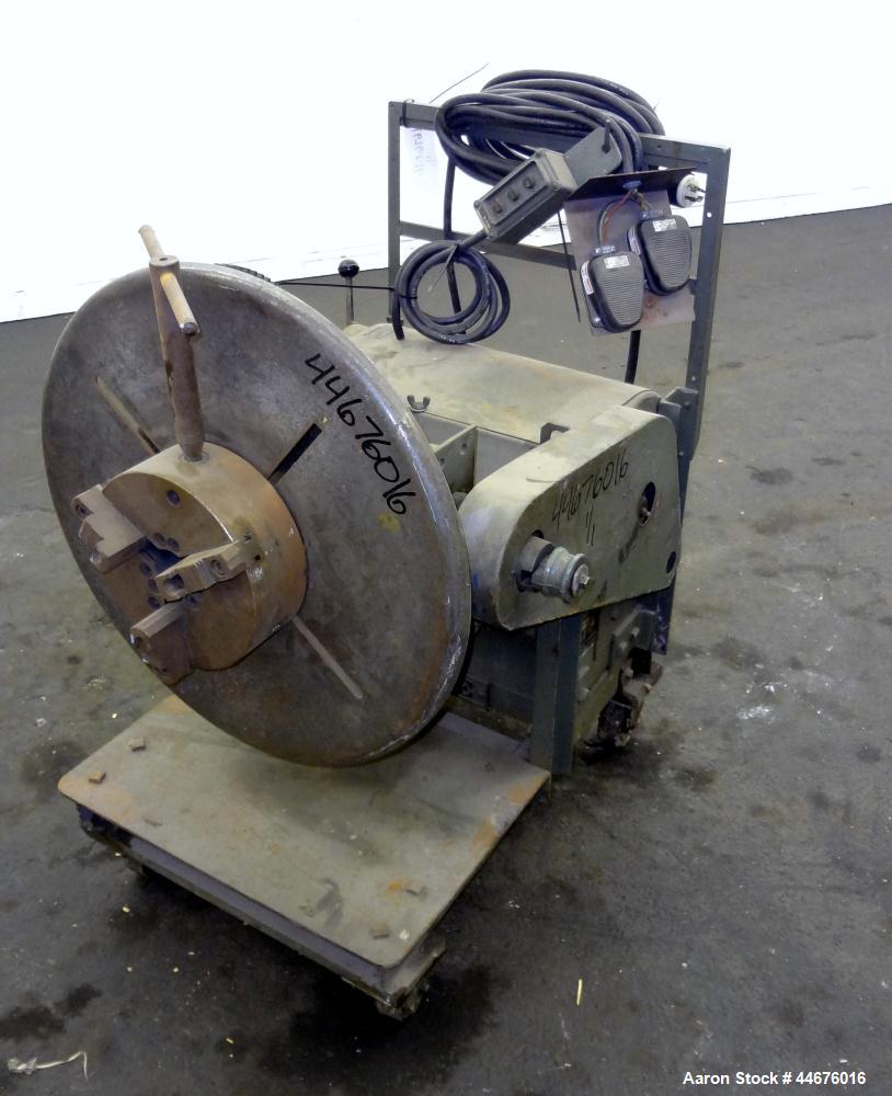 Used Ransome Welding Positioner, Size 5-HT. Approximate 500 pound capacity, foot pedal, and pendant control. Mounted on a frame with casters.