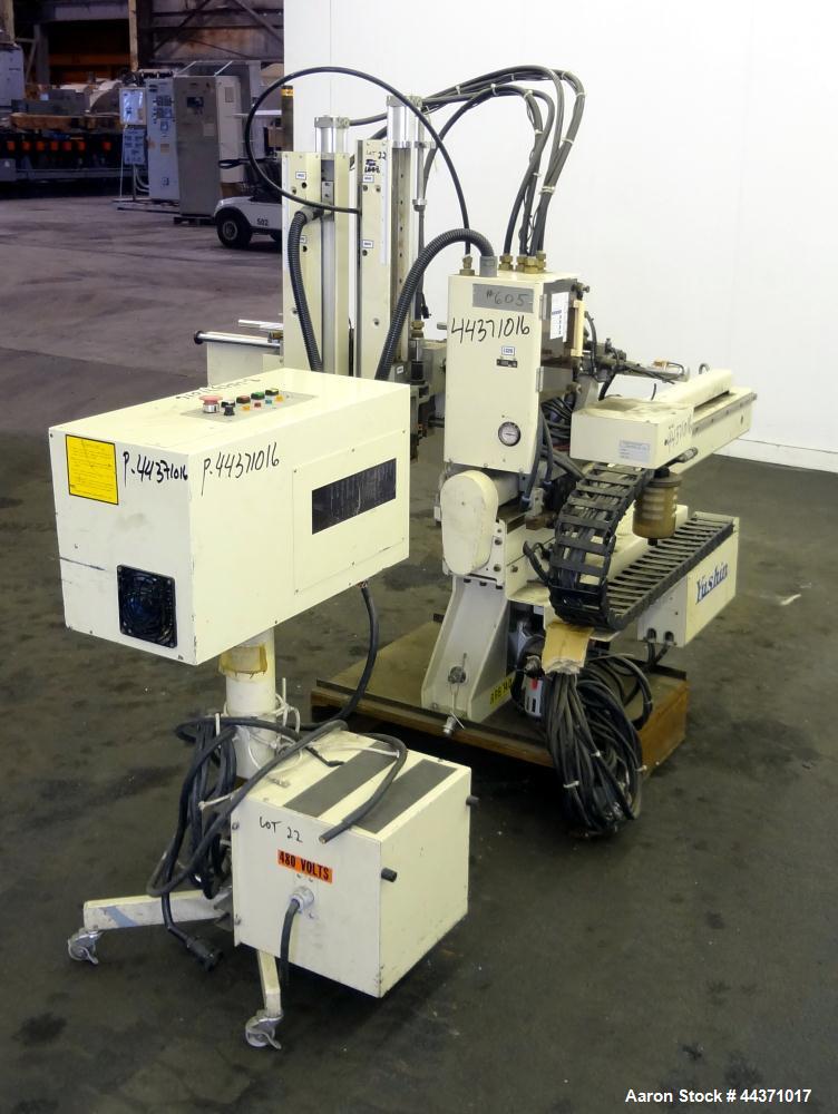 Used Yushin America Airliner AE-200D Robot. With a servo traverse and two pneumatic axes. Includes a model YC-3000 portable controller. Built 1993.