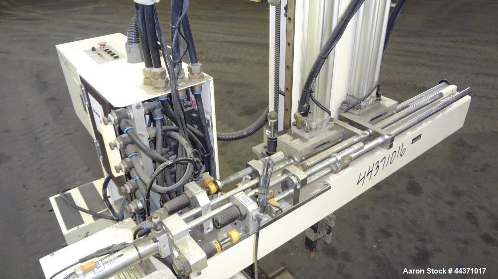 Used Yushin America Airliner AE-200D Robot. With a servo traverse and two pneumatic axes. Includes a model YC-3000 portable controller. Built 1993.