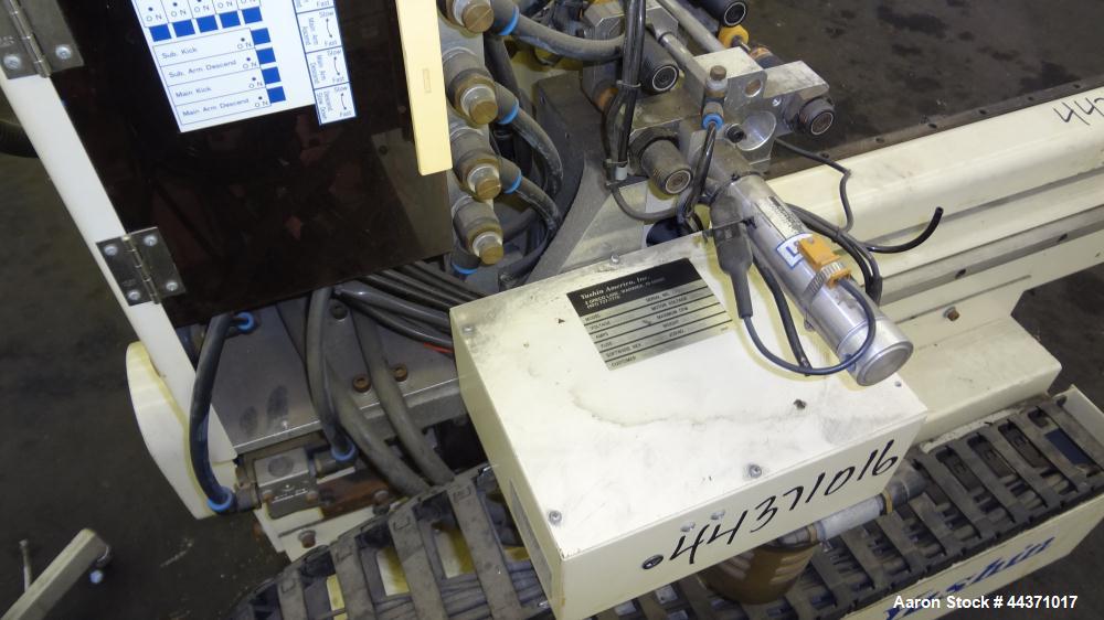 Used Yushin America Airliner AE-200D Robot. With a servo traverse and two pneumatic axes. Includes a model YC-3000 portable controller. Built 1993.
