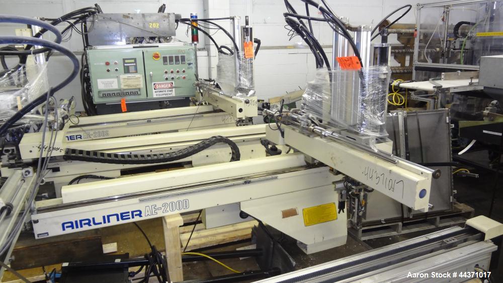 Used Yushin America Airliner AE-200D Robot. With a servo traverse and two pneumatic axes. Includes a model YC-3000 portable controller. Built 1993.