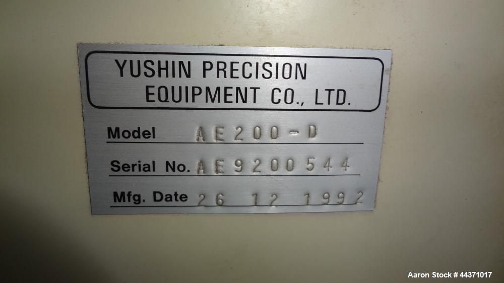 Used Yushin America Airliner AE-200D Robot. With a servo traverse and two pneumatic axes. Includes a model YC-3000 portable controller. Built 1993.
