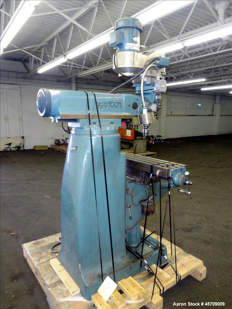 Used- Enco Variable Speed Vertical Milling Machine. Table size 49" long x 9" wide. Approximate table travels: longitudinal 3...