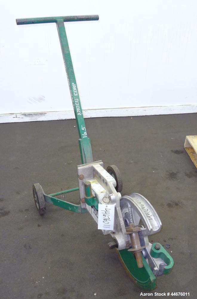 Used Greenlee Mechanical Pipe Bender, Model 1818.  EMT capacity 3/4" - 2", rigid capacity 1/2" - 1-1/2", IMC capacity 1/2" - 1-1/4", aluminum 1/2" - 1-1/2".  Mounted on wheels.
