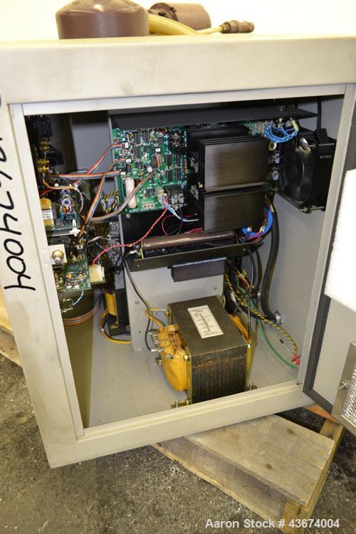 Used Hansvedt Ram Type EDM, Model Benchman. Work table size 9.4" x 14.2", table travel 5.5" x 8.5", work tank size 16" x 24" x 11" high, platen to table 18" maximum, 10" minimum, ram travel 8", plate...