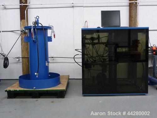 Used Hydro-Test Products Hydrostatic Water Jacket Cylinder Test Station.  Test range of 2,000 - 9,000 psi in auto mode; 2,000 - 10,000 in manual mode.  Includes air operated pressure test pump, 14" d...