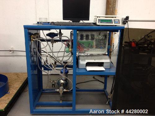 Used Hydro-Test Products Hydrostatic Water Jacket Cylinder Test Station.  Test range of 2,000 - 9,000 psi in auto mode; 2,000 - 10,000 in manual mode.  Includes air operated pressure test pump, 14" d...