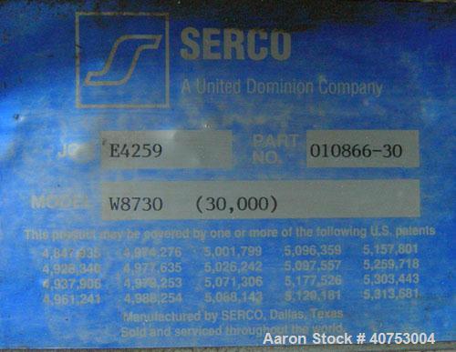 Used Serco Mechanical Dock Leveler, model W8730, carbon steel. 83" wide x 81" long plate with a lip extension. Approximate 30,000 pound capacity.