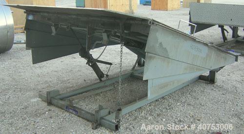 Used Serco Mechanical Dock Leveler, model W8730, carbon steel. 83" wide x 81" long plate with a lip extension. Approximate 30,000 pound capacity.