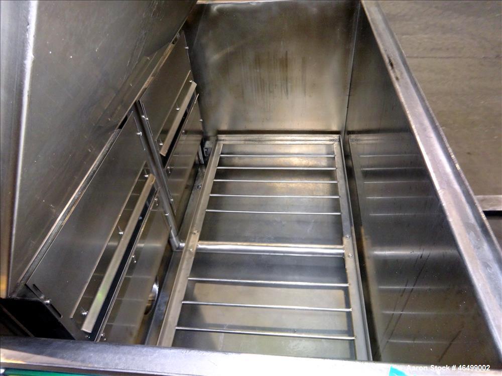 Used Ramco Equipment Migi-Kleen Parts Dryer, Model MK48EBSS, 304 Stainless Steel. 150 Pound capacity, heating rated 18 kw. Working zone 46" long x 21" wide x 16" deep, internal tank 48" long x 26" wi...