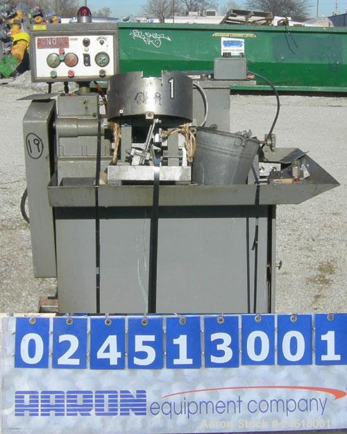 Used Snow Manufacturing Single/Horizontal Spindle Tapping Machine, Model HT-1-S. With vibratory bowl feed hopper and feed chute for the automatic (in/out) tapping of holes up to 6mm diameter in nuts ...
