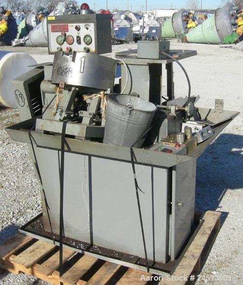 Used Snow Manufacturing Single/Horizontal Spindle Tapping Machine, Model HT-1-S. With vibratory bowl feed hopper and feed chute for the automatic (in/out) tapping of holes up to 6mm diameter in nuts ...