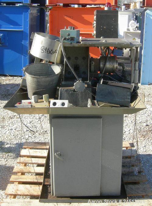 Used Snow Manufacturing Single/Horizontal Spindle Tapping Machine, Model HT-1-S. With vibratory bowl feed hopper and feed chute for the automatic (in/out) tapping of holes up to 6mm diameter in nuts ...