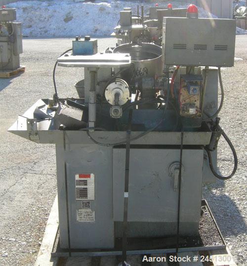 Used Snow Manufacturing Single/Horizontal Spindle Tapping Machine, Model HT-1-S. With vibratory bowl feed hopper and feed chute for the automatic (in/out) tapping of holes up to 6mm diameter in nuts ...