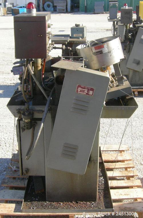 Used Snow Manufacturing Single/Horizontal Spindle Tapping Machine, Model HT-1-S. With vibratory bowl feed hopper and feed chute for the automatic (in/out) tapping of holes up to 6mm diameter in nuts ...