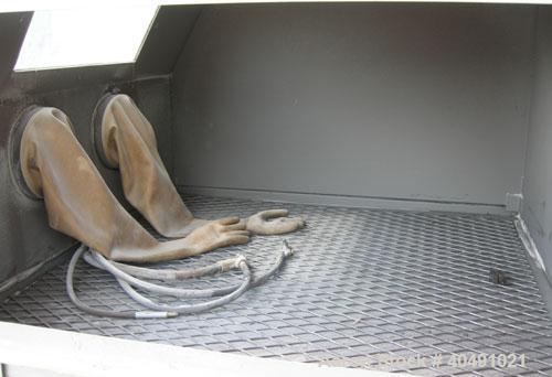 Used Trinity Tool Company Dry Blast Sandblast Cabinet, model 48X48SL/DELUXE, carbon steel. 48" wide x 48" deep work area. Lighted hinged cabinet, 2 hand holes, viewing window, and a side access door....