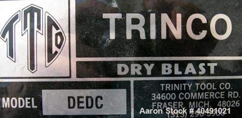Used Trinity Tool Company Dry Blast Sandblast Cabinet, model 48X48SL/DELUXE, carbon steel. 48" wide x 48" deep work area. Lighted hinged cabinet, 2 hand holes, viewing window, and a side access door....