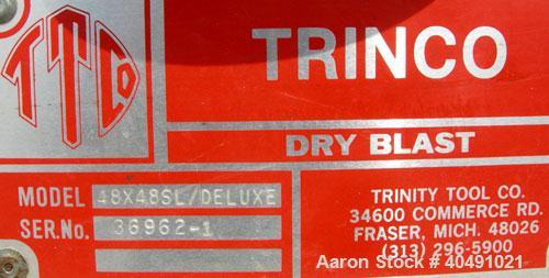 Used Trinity Tool Company Dry Blast Sandblast Cabinet, model 48X48SL/DELUXE, carbon steel. 48" wide x 48" deep work area. Lighted hinged cabinet, 2 hand holes, viewing window, and a side access door....