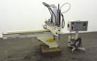Used Yushin America Airliner AE-200D Robot. With a servo traverse and two pneumatic axes. Includes a model YC-3000 portable controller. Built 1993.