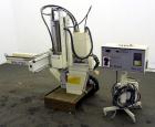 Used Yushin America Airliner AE-200D Robot. With a servo traverse and two pneumatic axes. Includes a model YC-3000 portable controller. Built 1993.