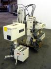Used Yushin America Airliner AE-200D Robot. With a servo traverse and two pneumatic axes. Includes a model YC-3000 portable controller. Built 1993.