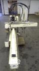 Used Yushin America Airliner AE-200D Robot. With a servo traverse and two pneumatic axes. Includes a model YC-3000 portable controller. Built 1993.