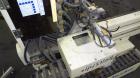 Used Yushin America Airliner AE-200D Robot. With a servo traverse and two pneumatic axes. Includes a model YC-3000 portable controller. Built 1993.