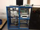 Used Hydro-Test Products Hydrostatic Water Jacket Cylinder Test Station.  Test range of 2,000 - 9,000 psi in auto mode; 2,000 - 10,000 in manual mode.  Includes air operated pressure test pump, 14