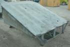 Used Serco Mechanical Dock Leveler, model W8730, carbon steel. 83
