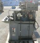 Used Snow Manufacturing Single/Horizontal Spindle Tapping Machine, Model HT-1-S. With vibratory bowl feed hopper and feed chute for the automatic (in/out) tapping of holes up to 6mm diameter in nuts ...