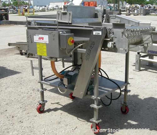 Used Stein all purpose batter applicator, model APB-24, 304 stainless steel. 24" wide x 96" long wire mesh belt, driven by an approximately 1 hp gearmotor. Dual curtain overflow with overflow and a 1...