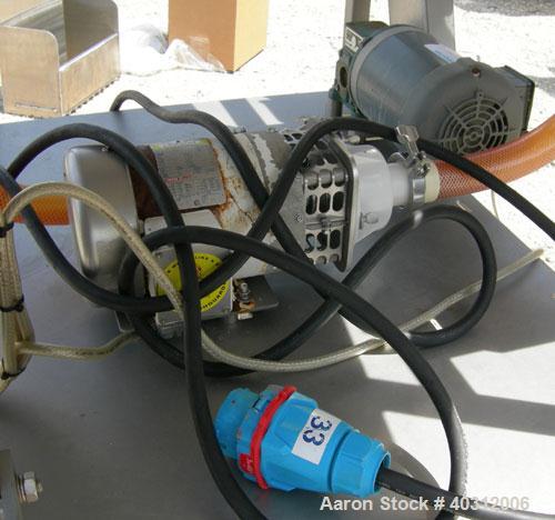 Used Stein all purpose batter applicator, model APB-24, 304 stainless steel. 24" wide x 96" long wire mesh belt, driven by an approximately 1 hp gearmotor. Dual curtain overflow with overflow and a 1...