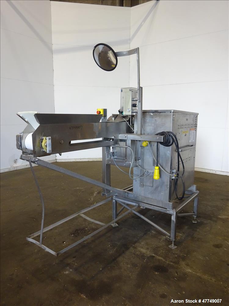 Used Baader Food Processing Machinery Soft Separator, Type 603, Stainless Steel. Approximate 6" wide x 50" long plastic belt in feed. Last used separating plastic wrappers off of cheese slices. Mount...