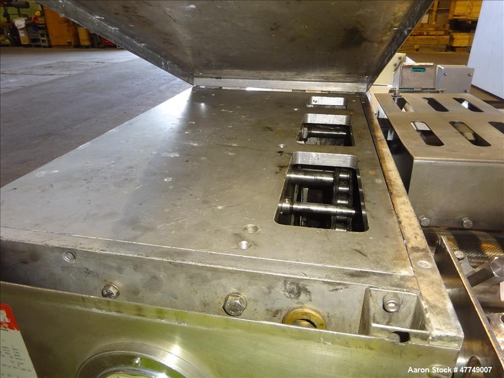 Used Baader Food Processing Machinery Soft Separator, Type 603, Stainless Steel. Approximate 6" wide x 50" long plastic belt in feed. Last used separating plastic wrappers off of cheese slices. Mount...