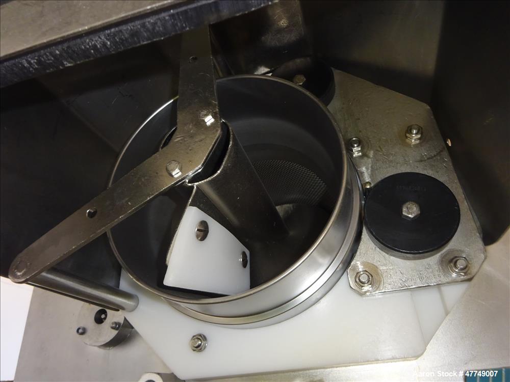 Used Baader Food Processing Machinery Soft Separator, Type 603, Stainless Steel. Approximate 6" wide x 50" long plastic belt in feed. Last used separating plastic wrappers off of cheese slices. Mount...
