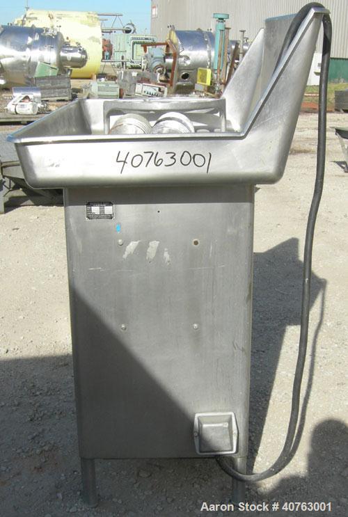 Used Butcher Boy Meat Grinder, Model A56.HF, 304 stainless steel. Top tray 49 1/2" wide x 27" long x approximately 6" deep. Straight barrel, (2) feed screws. Driven by a 5 hp, 3/60/230/460 volt, 1730...