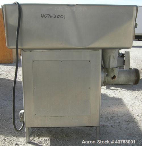 Used Butcher Boy Meat Grinder, Model A56.HF, 304 stainless steel. Top tray 49 1/2" wide x 27" long x approximately 6" deep. Straight barrel, (2) feed screws. Driven by a 5 hp, 3/60/230/460 volt, 1730...