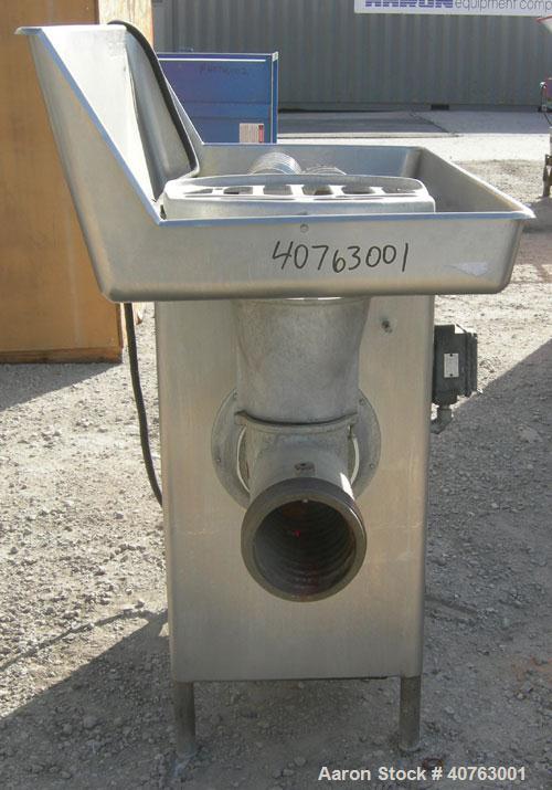 Used Butcher Boy Meat Grinder, Model A56.HF, 304 stainless steel. Top tray 49 1/2" wide x 27" long x approximately 6" deep. Straight barrel, (2) feed screws. Driven by a 5 hp, 3/60/230/460 volt, 1730...