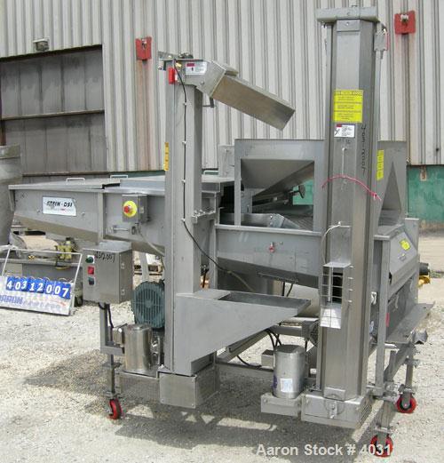 Used Stein breading applicator, model E-24J, 304 stainless steel. "J" configuration. Breader capacity 50-90 pounds. 25" wide x 96" long wire mesh belt, driven by a 2 hp, 3/60/230/460 volt, 1725 rpm g...
