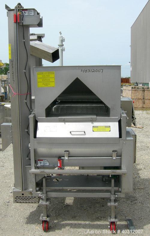 Used Stein breading applicator, model E-24J, 304 stainless steel. "J" configuration. Breader capacity 50-90 pounds. 25" wide x 96" long wire mesh belt, driven by a 2 hp, 3/60/230/460 volt, 1725 rpm g...