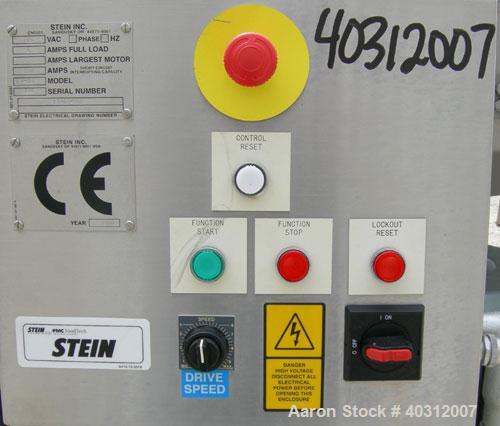Used Stein breading applicator, model E-24J, 304 stainless steel. "J" configuration. Breader capacity 50-90 pounds. 25" wide x 96" long wire mesh belt, driven by a 2 hp, 3/60/230/460 volt, 1725 rpm g...