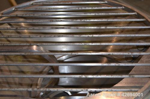 Used Handtmann Vacuum Filler, Model VF10-50, Code 65/25, Carbon steel. Top feed hopper with mixing arm, driven by a 0.55kw, 3/60/200 volt, 1700 rpm motor. Removable vane feeder driven by a 1.5/4.4kw,...