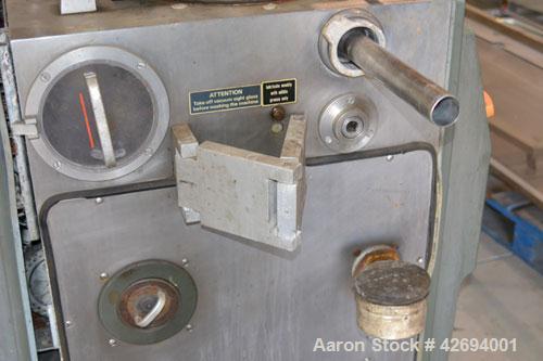 Used Handtmann Vacuum Filler, Model VF10-50, Code 65/25, Carbon steel. Top feed hopper with mixing arm, driven by a 0.55kw, 3/60/200 volt, 1700 rpm motor. Removable vane feeder driven by a 1.5/4.4kw,...
