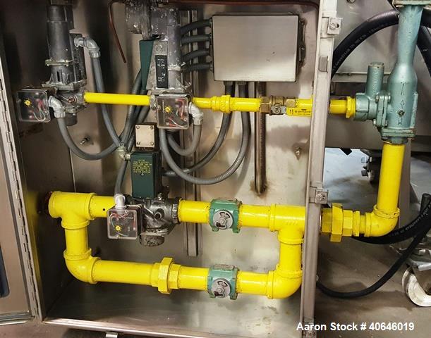 Used Heat & Control Rotary Brander. Continuously brand grill marks to the top of products. 20" wide stainless steel mesh conveyor belt, 27" in hood chamber, 63" overall length. Baldor 1/3 hp motor wi...