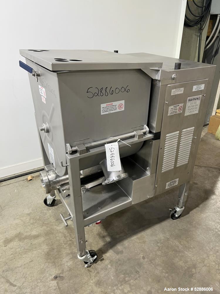 Used Hollymatic Mixer Grinder, Model 180A , 304 Stainless Steel construction. 225lbs Capacity hopper, #52 grinder head. Approximate 23-3/4" wide x 20" long x 26" deep trough, with top hinged cover. A...
